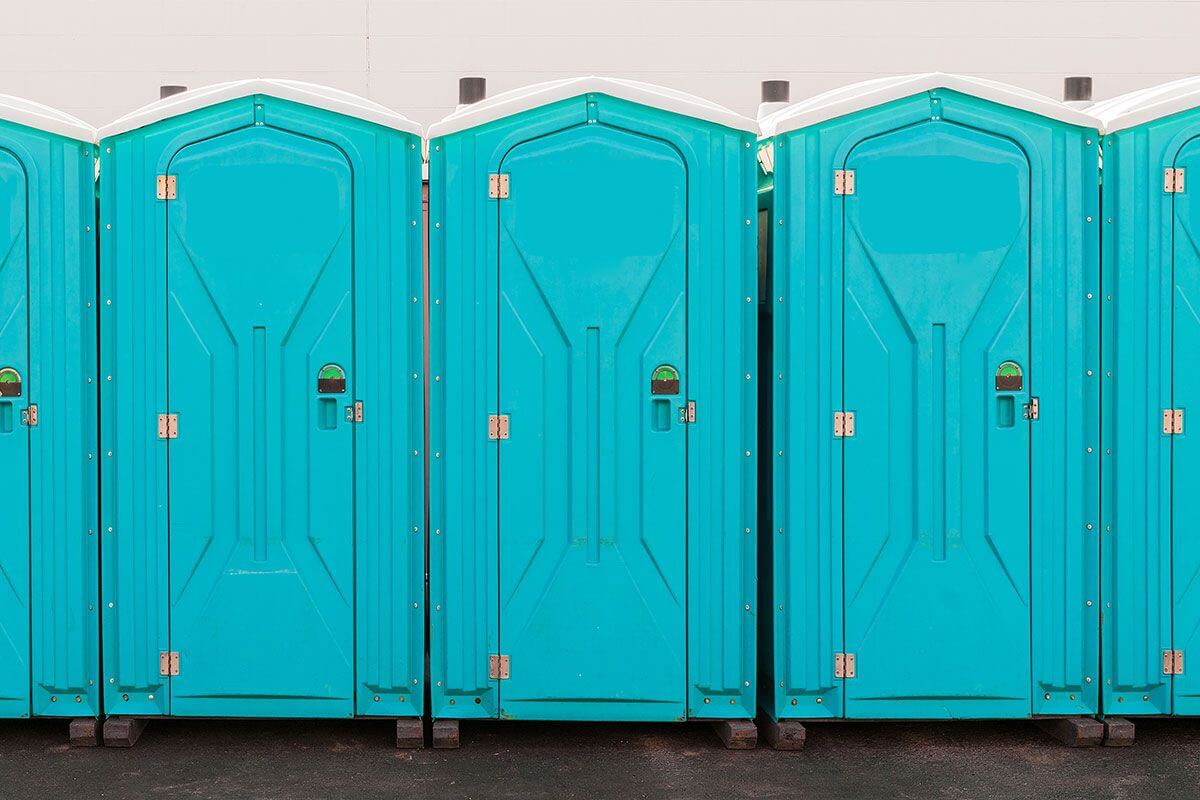 Industrial portable restroom units at a plant in Minneapolis, Minnesota